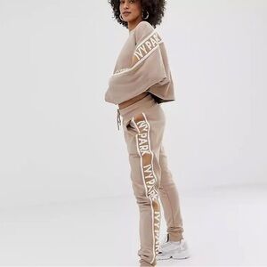 IVY PARK tan logo tape joggers